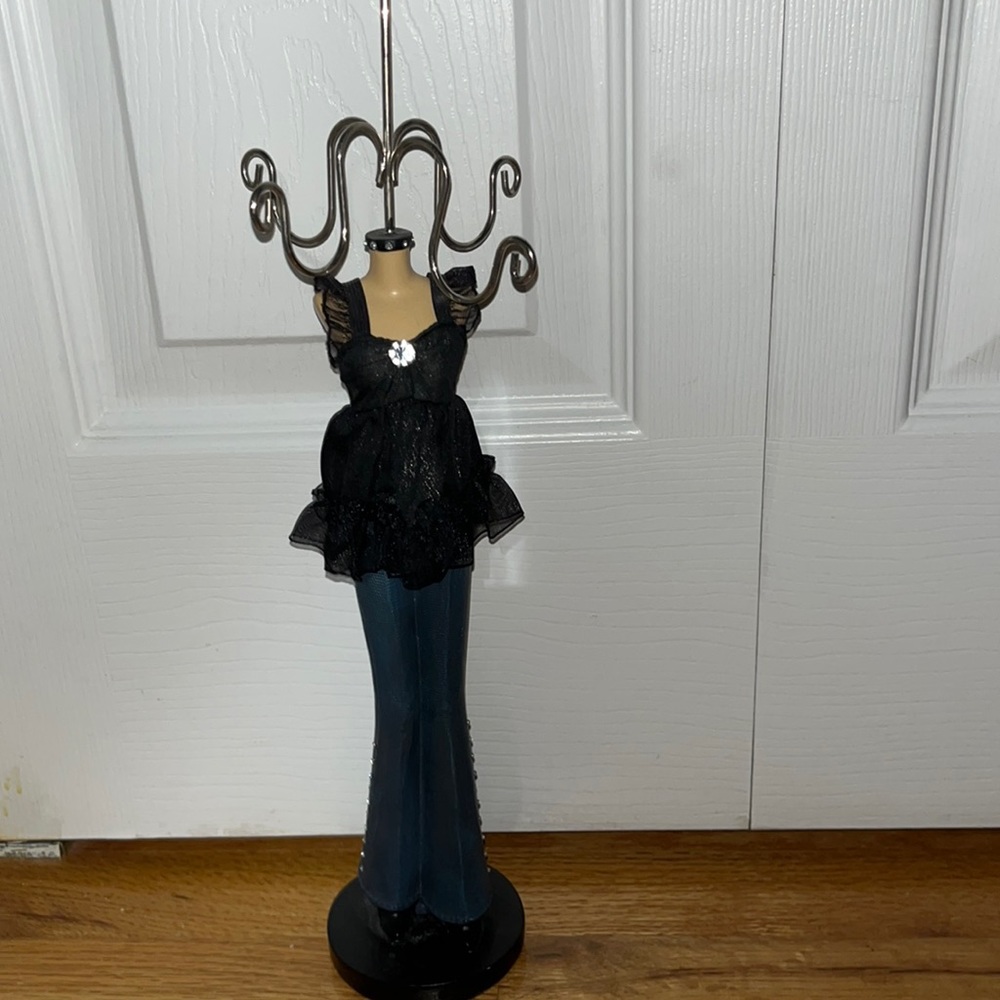 Miniature mannequin jewellery rack